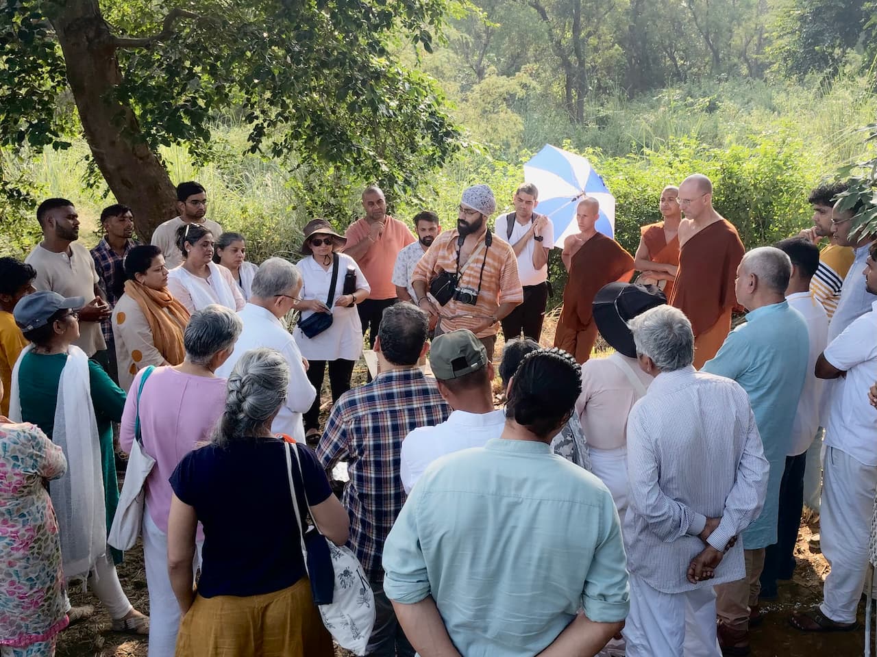Crowd gathers around the architect