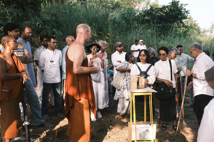 Monks discussing the design